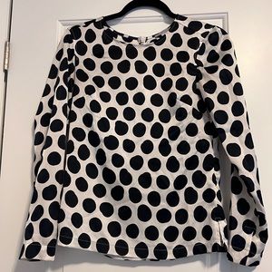 White with navy polka dot blouse